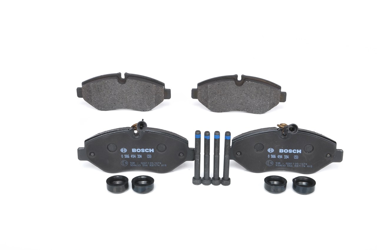 BOSCH 0 986 494 334 Brake pad set Low-Metallic, with integrated wear sensor, with mounting manual, with anti-squeak plate, with bolts/screws